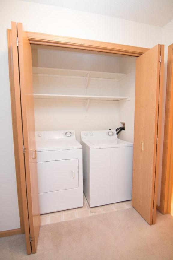 a laundry room with a washer and dryer