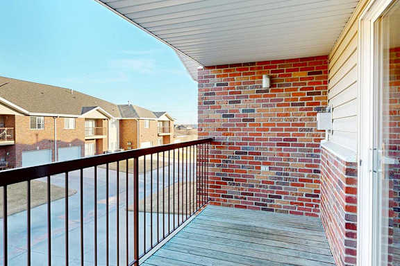 a balcony with room for seating