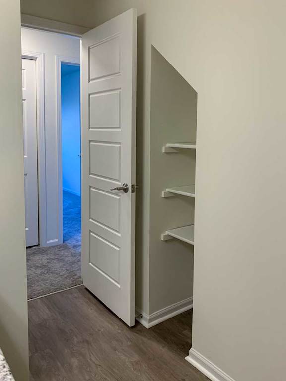 a bathroom with built-in in-wall storage