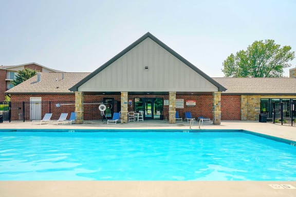 A swimming pool behind the clubhouse
