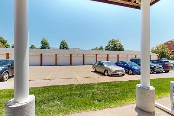 A view from the patio space, with easy access to parking and detached garages.