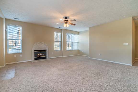 Interiors-Ridge Pointe Villas large open living room with tons of windows and natural lighting