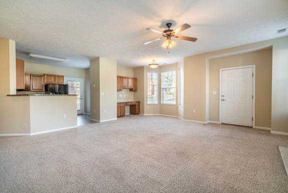 view from living room with kitchen and study desk at Ridge Pointe Villas