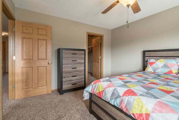 Second bedroom with walk-in closet at Southwind Villas in southwest Omaha in La Vista, NE, 68128