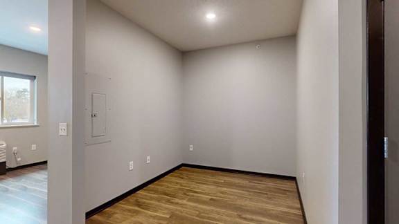 a sleeping area with privacy walls while maintaining an open-concept design