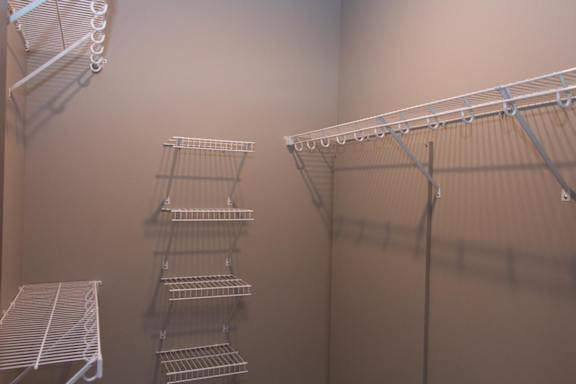 Wire shelving in a walk-in closet