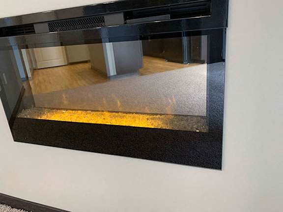 Relaxing electric fireplace in a 1 bedroom apartment for rent at The Flats at 84 apartments Lincoln NE 68516