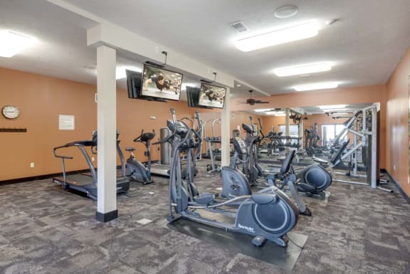 Large fitness center with cardio equipment at The Flats at 84 in southeast Lincoln NE 68516