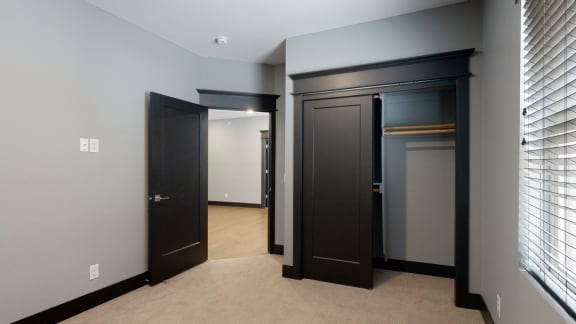 bedroom with closet and window