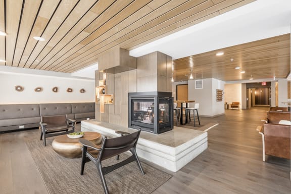 Sitting areas in the clubhouse near the fireplace at The Preserve