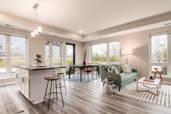 Kitchen Island and Living Room View at The Preserve at Normandale Lake