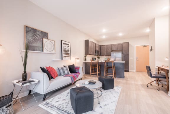 Living room and kitchen view at The Preserve at Normandale Lake in Bloomington, MN