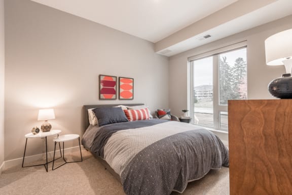 Large bedroom with natural light at The Preserve at Normandale Lake in Bloomington, MN
