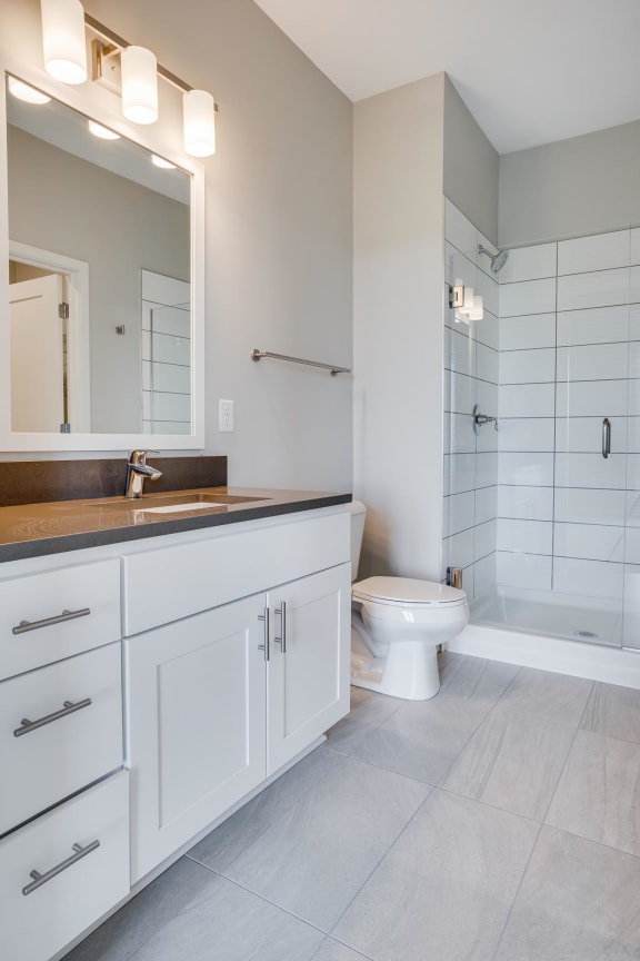 The Harriet features spacious bathrooms with custom tile shower
