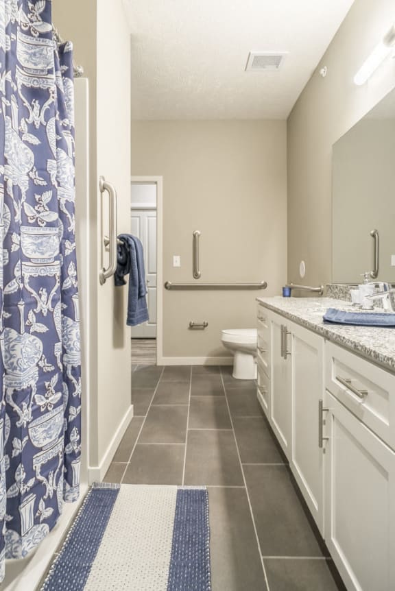 Primary bedroom with large vanity and shower
