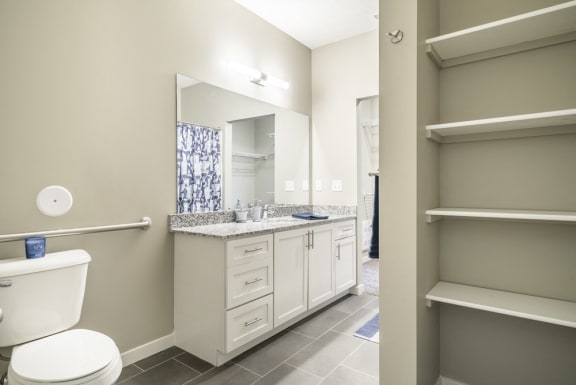 Primary bedroom with linen storage
