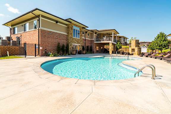 resort style swimming pool outside the clubhouse at The Villas of Omaha at Butler Ridge