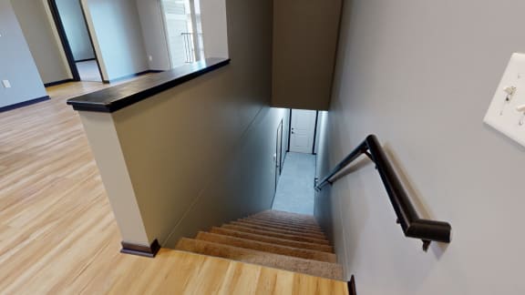 a view of the stairwell from the top of the stairs