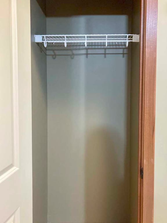 A metal shelf is mounted on the wall.