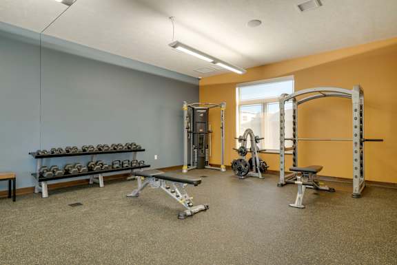 a 24-hour fitness center with weightlifting and cardio equipment