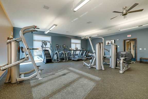 a 24-hour fitness center with weightlifting and cardio equipment