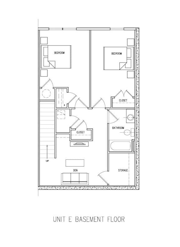 A floor plan of a unit E basement floor with labeled rooms.