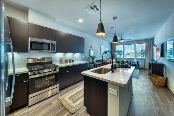 Kitchen with Stainless Steel Appliances and Gas Stove at Cuvee, Glendale Arizona