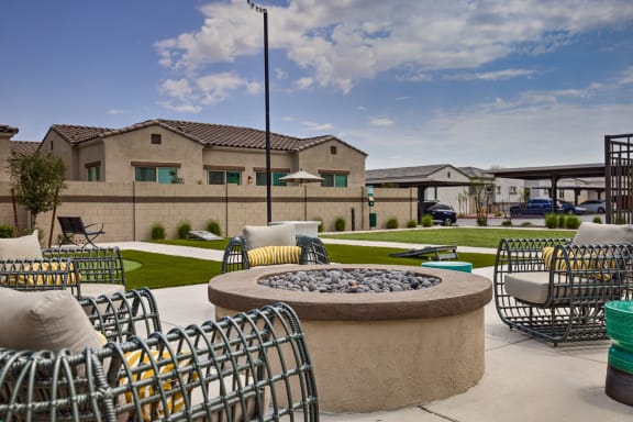 Outdoor Entertainment Area with Fire Pit at Pillar Lago