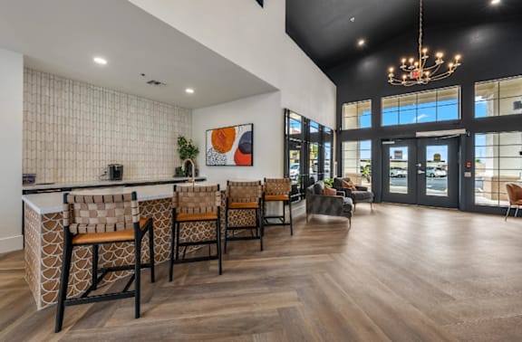 A modern interior with a bar area and seating.