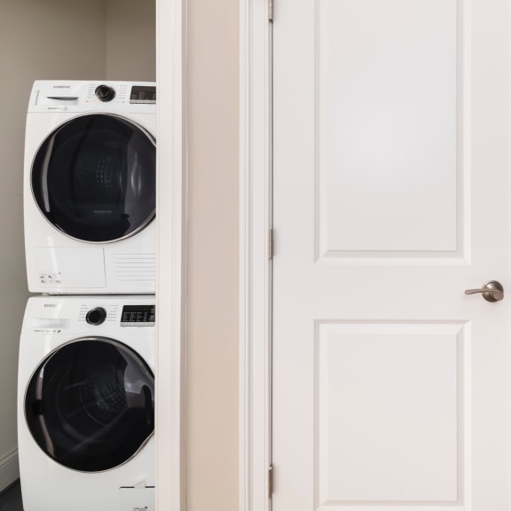 a washer and dryer in an apartment hall