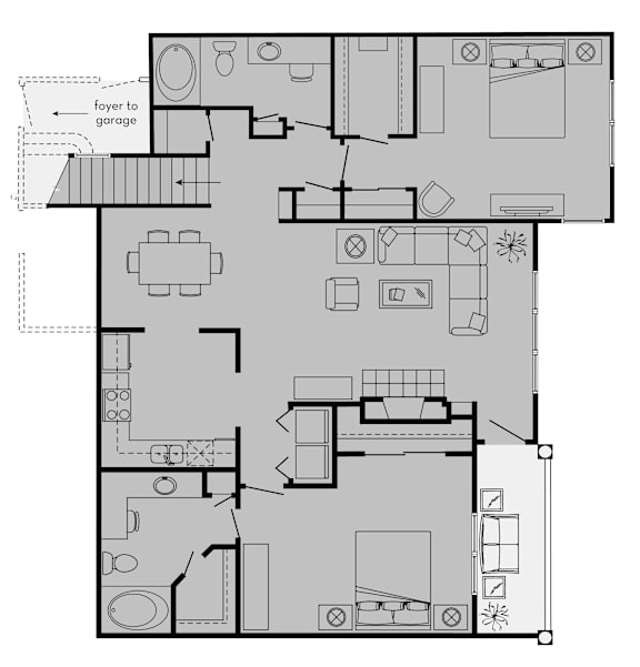 A floor plan of a house with a foyer leading to a garage.