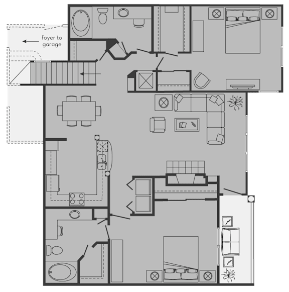 A floor plan of a house with a foyer leading to a garage.