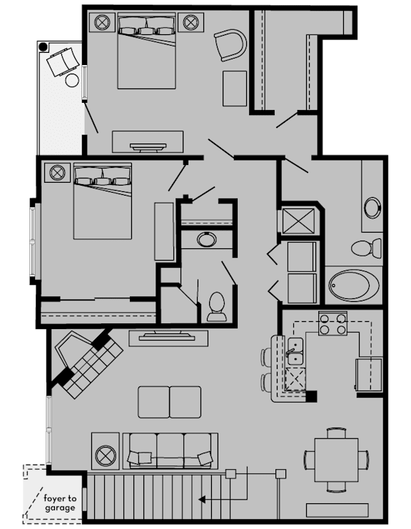 A floor plan of a house with a foyer leading to a garage.