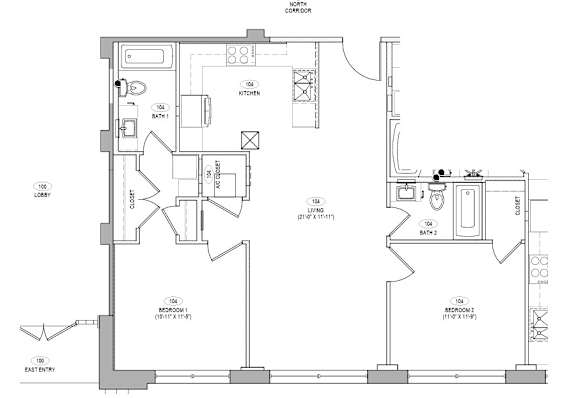 A floor plan of a house with a kitchen, living room, and two bathrooms.