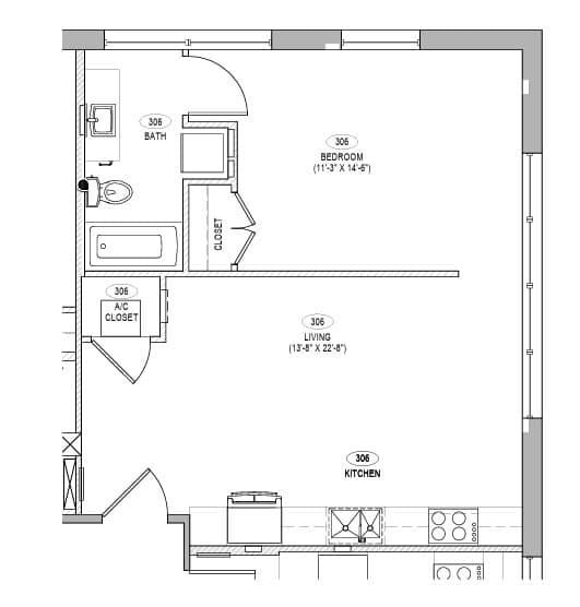A floor plan of a small apartment with a bedroom, living room, kitchen, and bathroom.