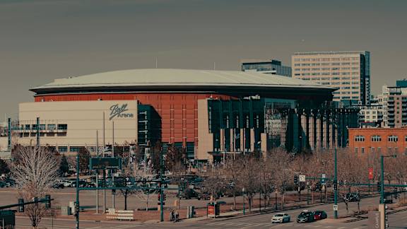 A large building with a red and white logo on the side of it. at Townview Plaza Apartments , Denver, CO, 80204