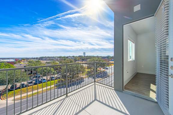 a balcony with a view of the city  at Presidium Pecan District, Texas