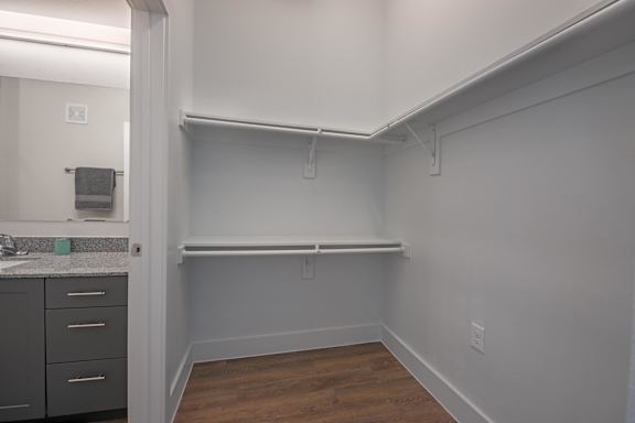 a walk in closet in a 555 waverly unit  at Presidium Pecan District, Pflugerville