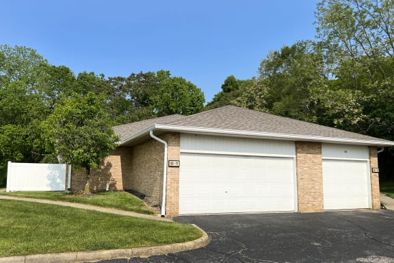 a home with a white garage door  at Wyndemere Apartments, Franklin