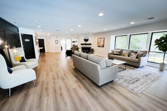 a living room with hardwood floors and white walls at Indian Lookout Apartments, Ohio