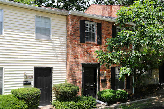 a brick and with black doors
