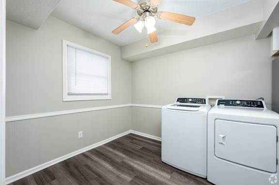 A laundry room with a washer and dryer.