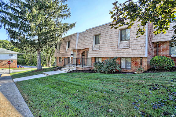 our apartments are located in a quiet neighborhood with green grass