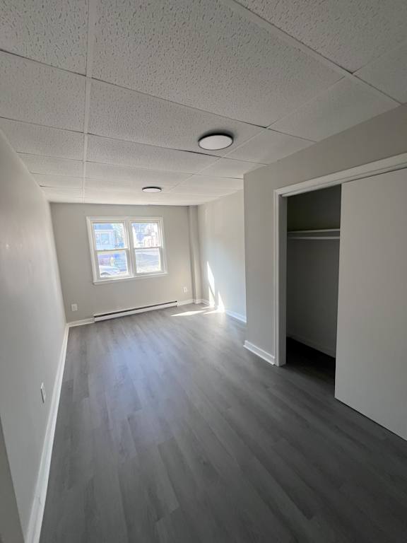 A room with a window and a door.