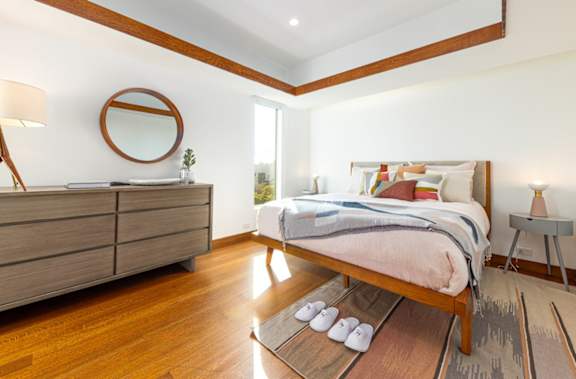 a bedroom with a bed and a dresser at 8535 Colgate-Fully Furnished Apartments, California, 90048