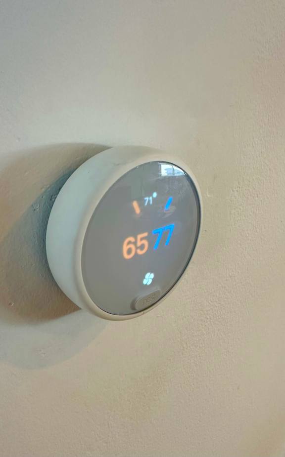 a timer on a wall with a clock on it at 8535 Colgate-Fully Furnished Apartments, Los Angeles