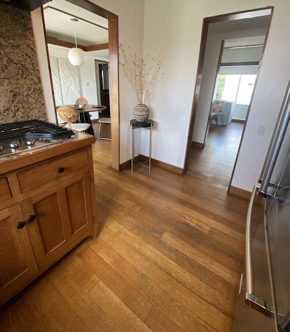 a view from the kitchen into the living room and the dining room at 8535 Colgate-Fully Furnished Apartments, Los Angeles
