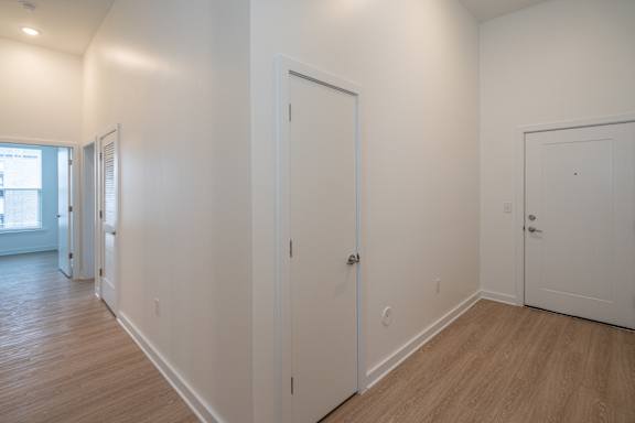 Open entry hallway/foyer with space for art and furniture pieces