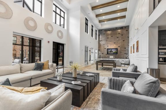 a living room with couches and a coffee table