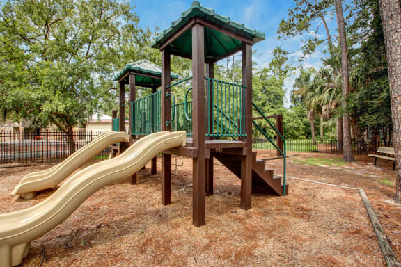children's playground with slides at Timberwalk at Mandarin Apartment Homes, Florida, 32257